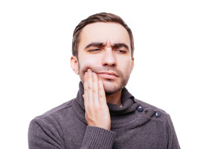 علاج انحسار اللثة وتخلخل الأسنان بالأعشاب